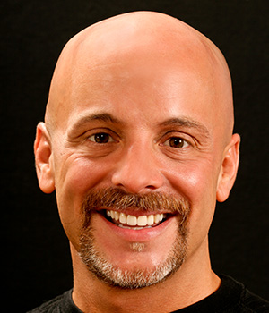 bald man smiling